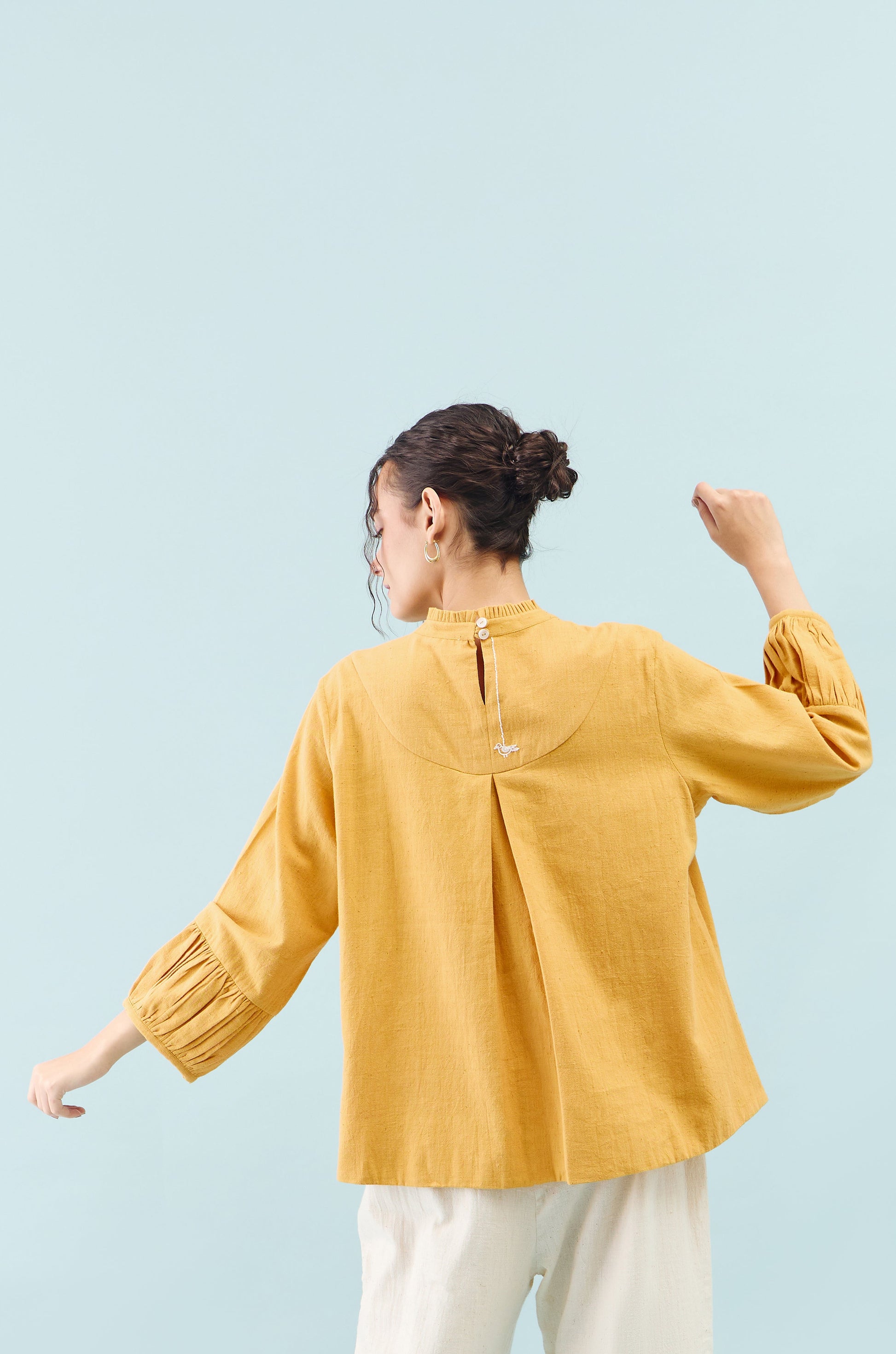 Mustard Tūla chidiya embroidered Top