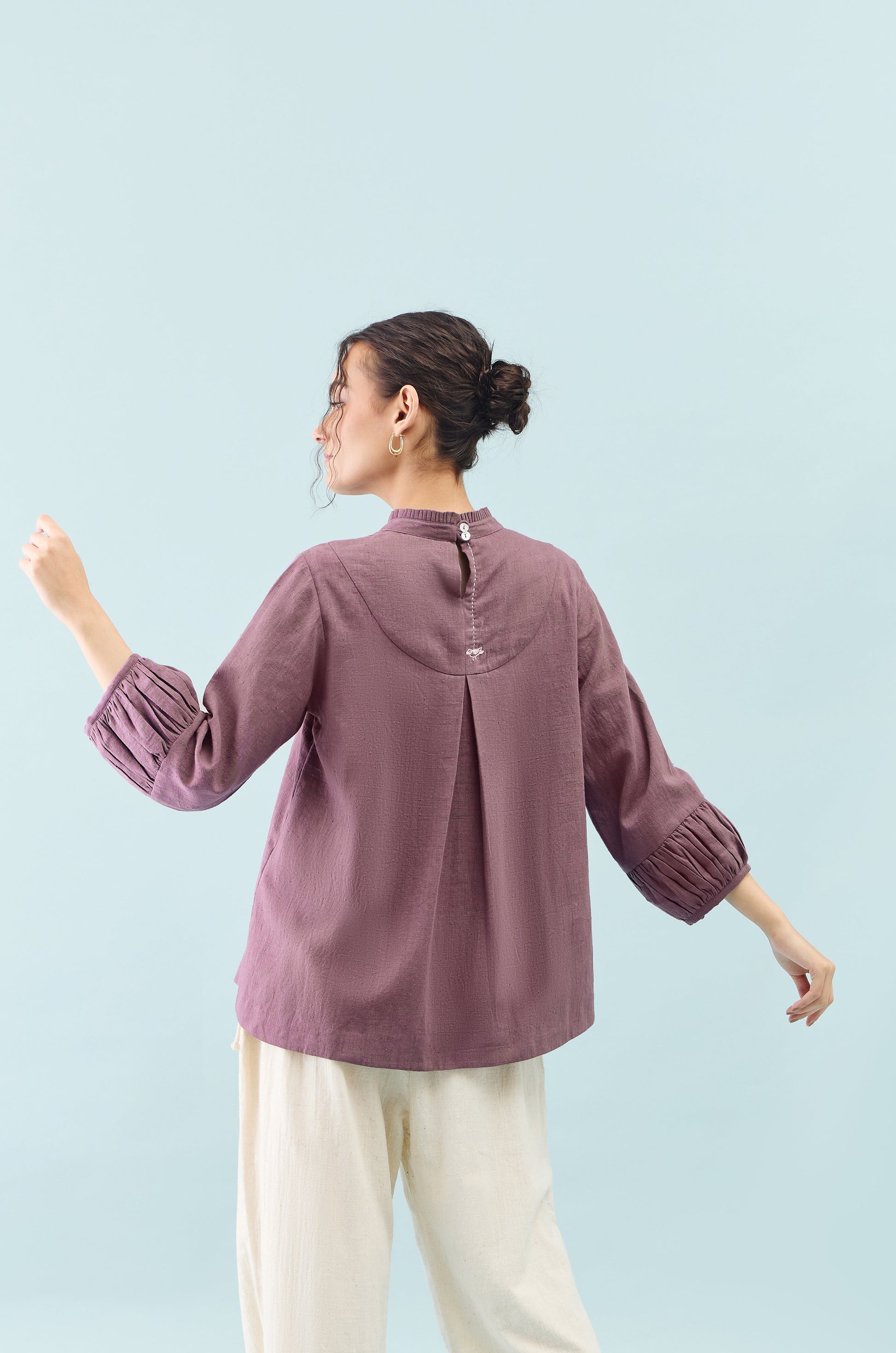 Purple Tūla chidiya embroidered Top